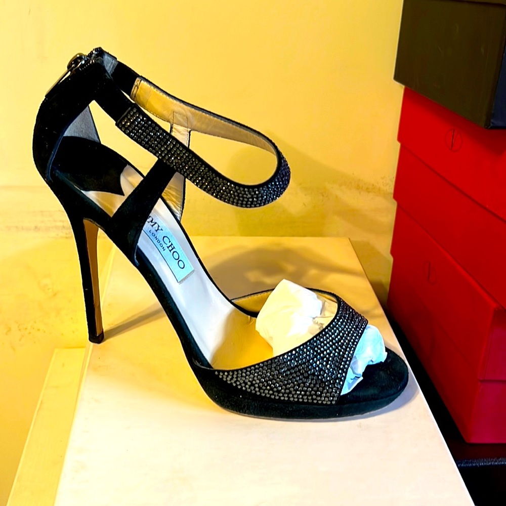 Used once suede with crystals skuff on left heel